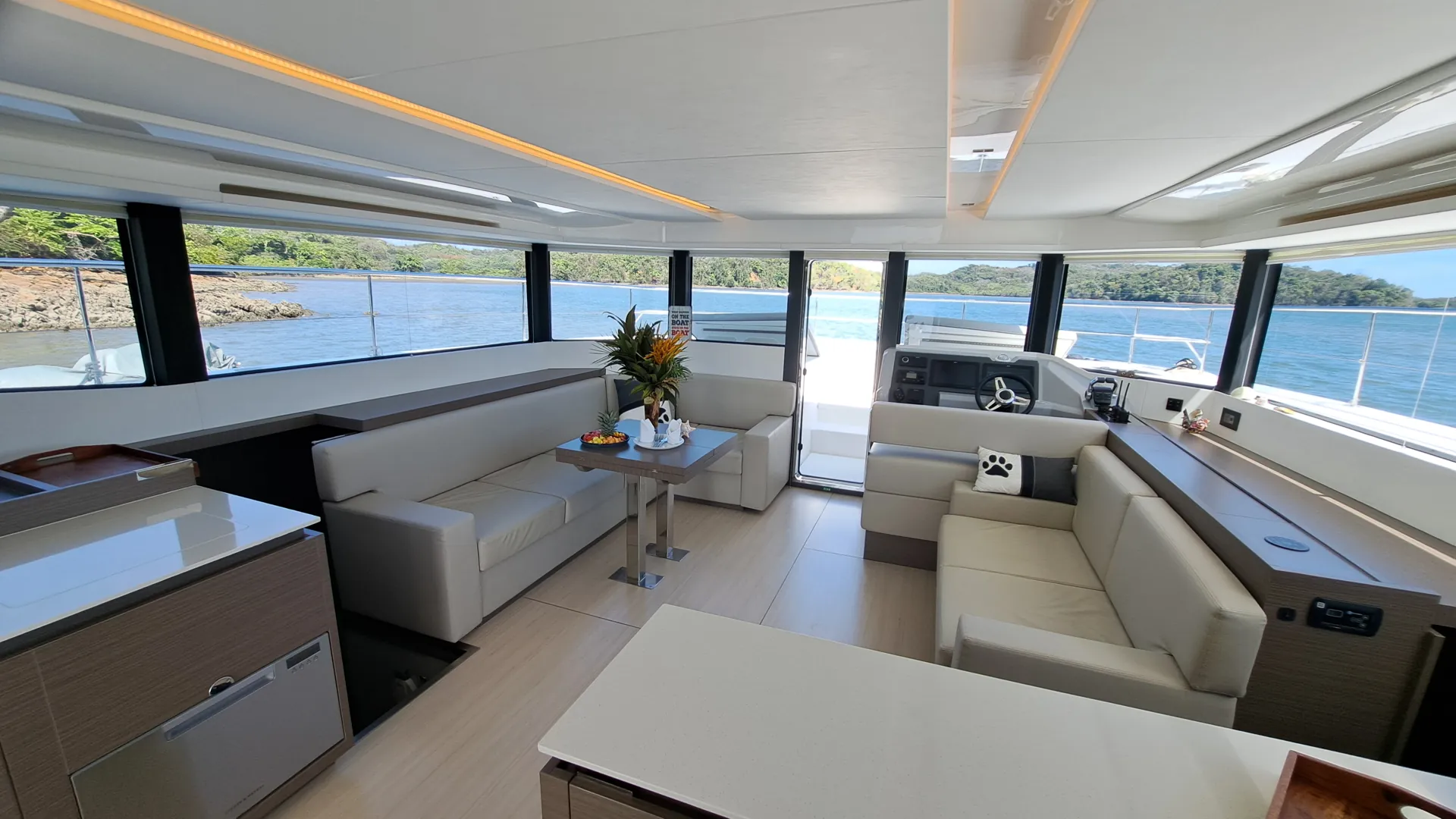 Saloon with panoramic windows on board the catamaran